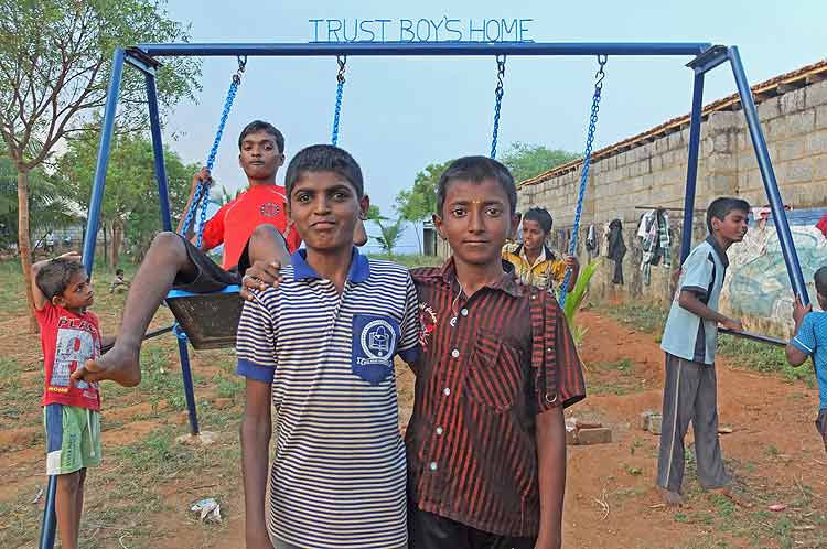 Boys on swing